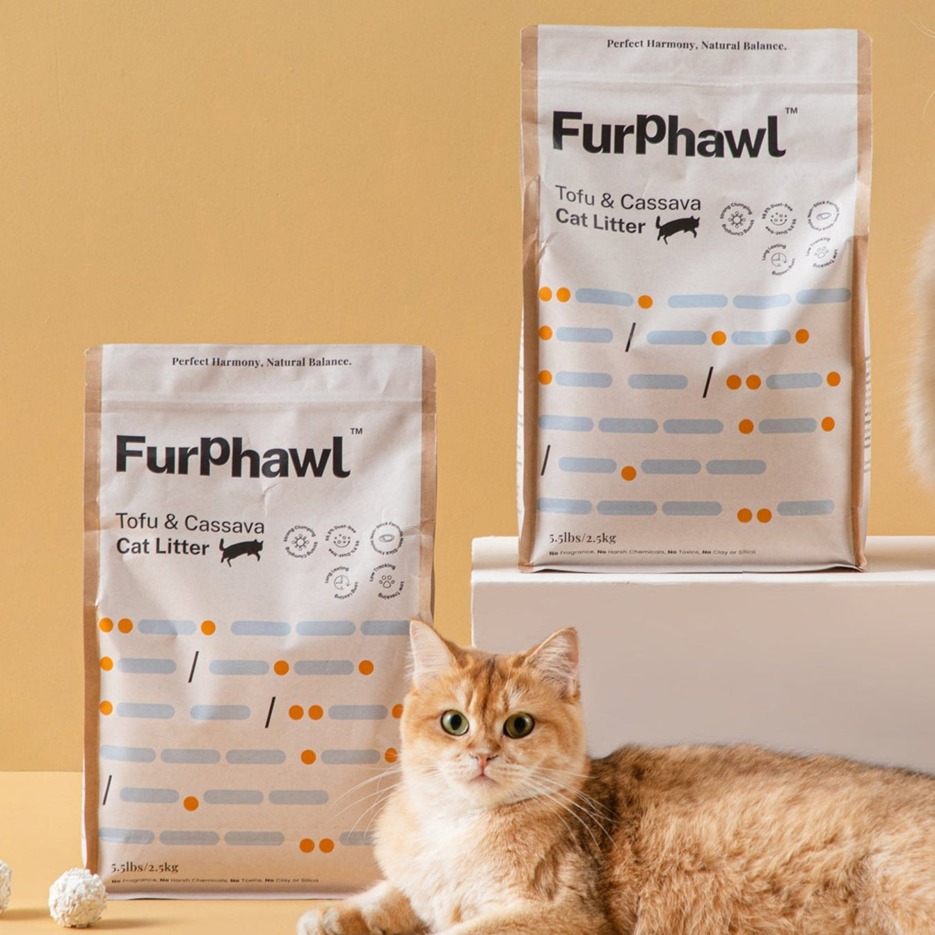 Two cats with FurPhawl Tofu&Cassava cat litter on a beige background