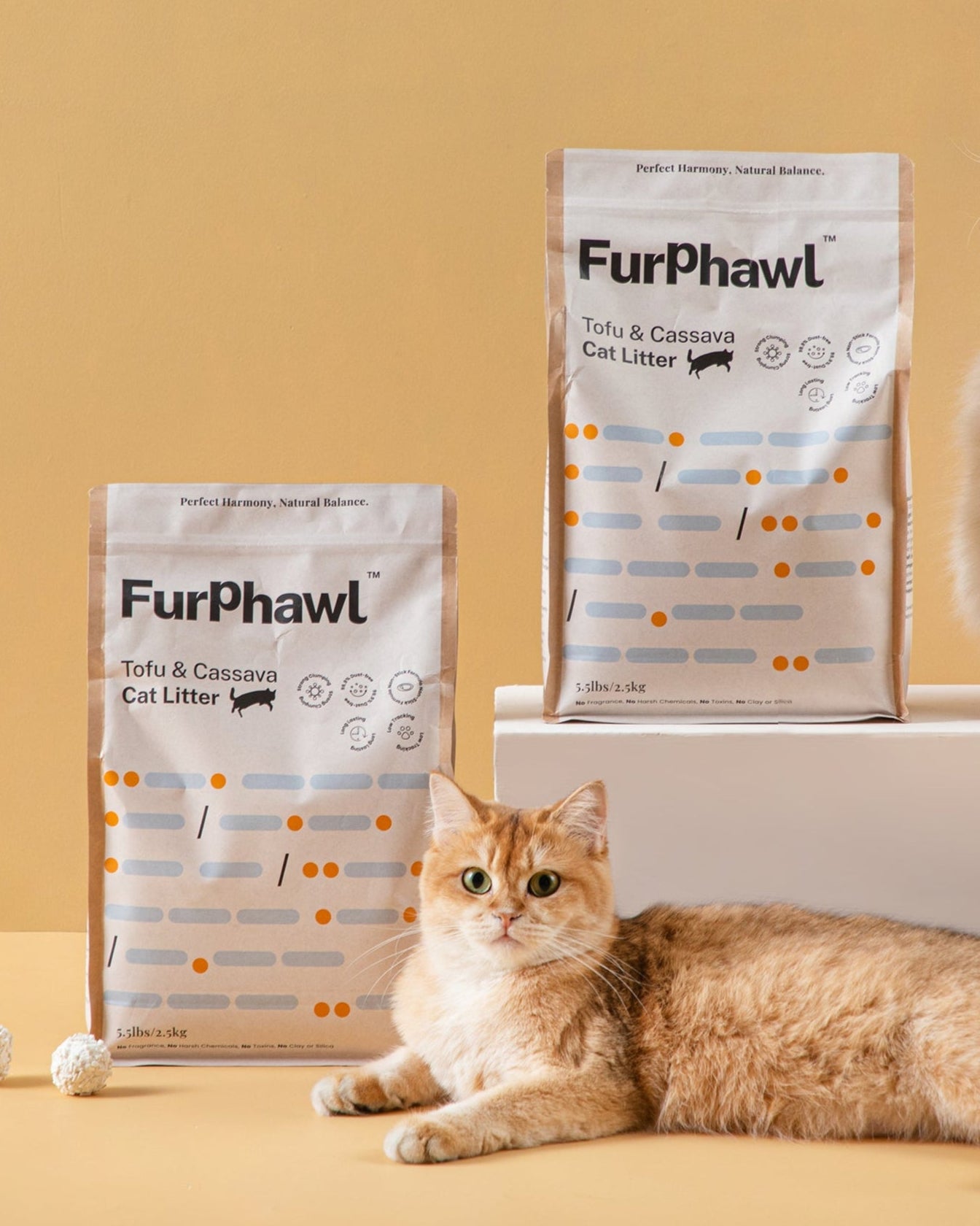 Two cats with FurPhawl Tofu&Cassava cat litter on a beige background